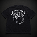 Black t-shirt with white graphic design on a dark background